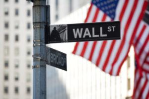 Wall Street Signage and American Flag