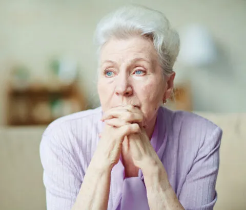 image of a distraught woman