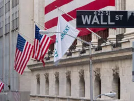 image of flags outside NY stock exchange
