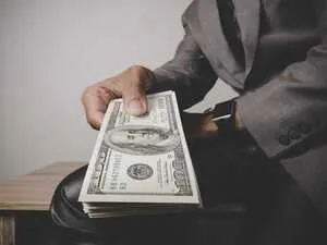 image of man with money